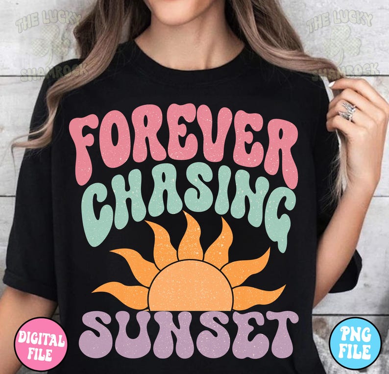 May include: A black t-shirt with the text "FOREVER CHASING SUNSET" in a retro, colorful font. The text is layered over a stylized orange sun with rays.