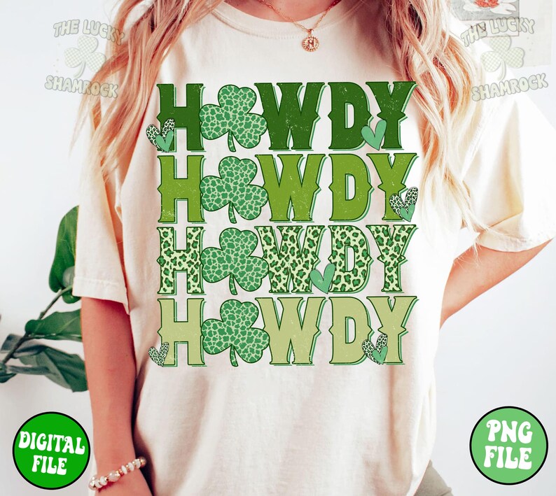 May include: A white t-shirt with the text "Howdy" repeated four times in green, with shamrock designs and a leopard print pattern.