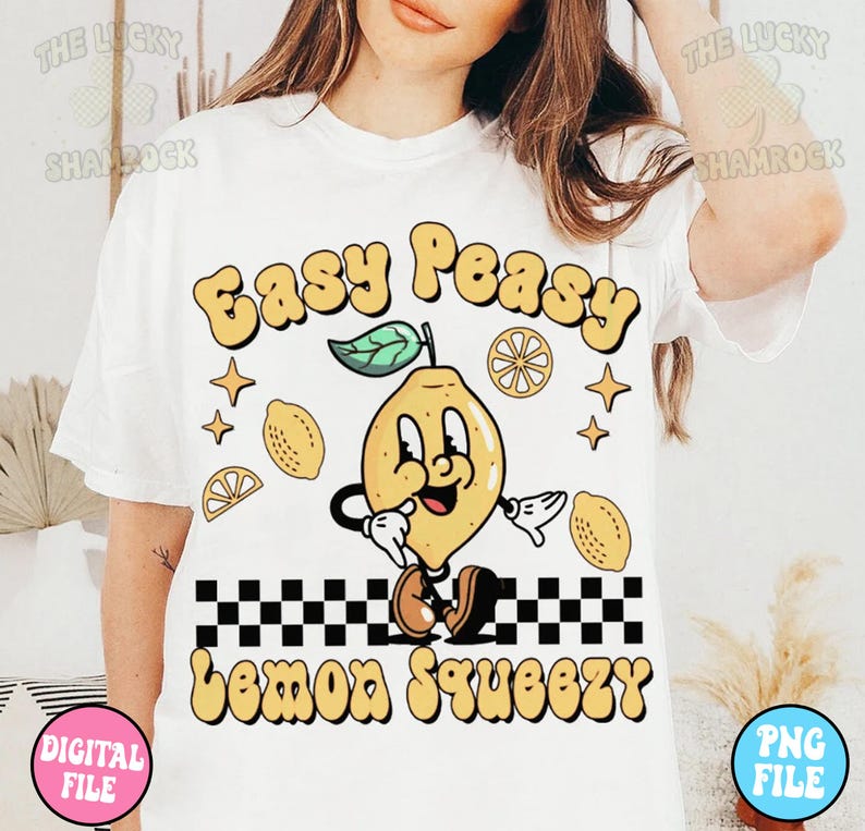 May include: White t-shirt with a yellow lemon cartoon character and the text "Easy Peasy Lemon Squeezy" in a retro style font.