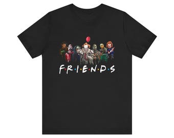 May include: Black t-shirt with a graphic of horror movie characters in a "Friends" style logo. The text "FRIENDS" is below the characters.