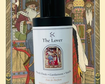 May include: A black-capped perfume bottle labeled "The Lover" with "Peach Flesh, Cardamom, Vanilla" notes. The bottle is 1.7 fl oz / 50 ml. The label features an illustration of people in a medieval setting. The background is a decorative illustration.