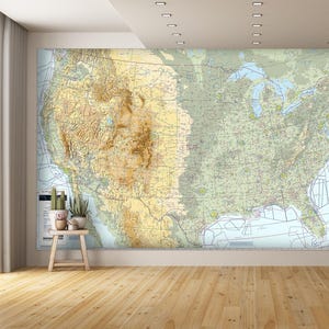 May include: A detailed map of the United States, showing state borders, major cities, and geographical features. The map is printed in shades of green, brown, and blue, with a white background.