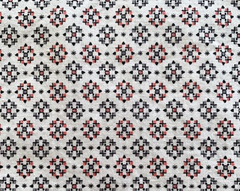 Fular vintage de los años 50 con estampado geométrico en algodón rosa y gris sobre blanco.