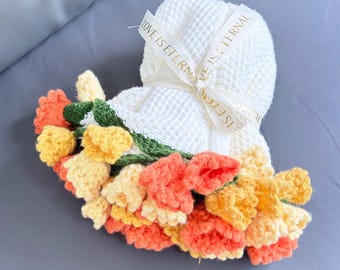 手作り仕上げのかぎ針編みスズランブーケブランケット、複数の色