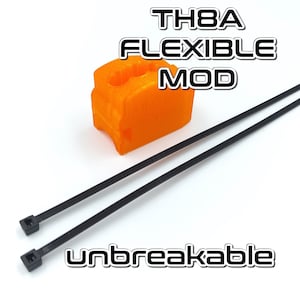 May include: A close-up of an orange 3D printed flexible mod for a TH8A, with two black cable ties. The text "TH8A FLEXIBLE MOD" is printed in black above the mod, and the text "unbreakable" is printed in black below the mod.
