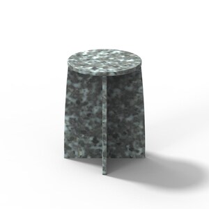 May include: A small, round, gray and white marble side table with a unique, geometric base.