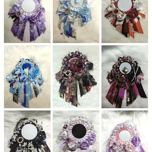 May include: A collection of nine decorative rosette badges. Each badge features a central circular element, surrounded by ribbons, fabric flowers, and embellishments in various colors, including purple, blue, red, and black. Some have decorative pins or charms.