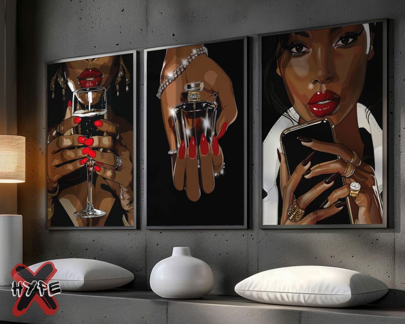 May include: Three framed art prints featuring a woman with red lipstick and nails. The first print shows the woman holding a glass of champagne. The second print shows the woman holding a bottle of perfume. The third print shows the woman holding a smartphone.