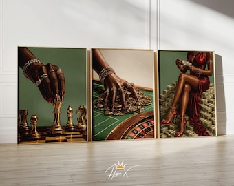 May include: A set of three framed wall art prints. The first shows a hand moving a gold chess piece. The second depicts a hand resting on a pile of gold casino chips on a roulette table. The third shows a person in a red dress sitting on money.