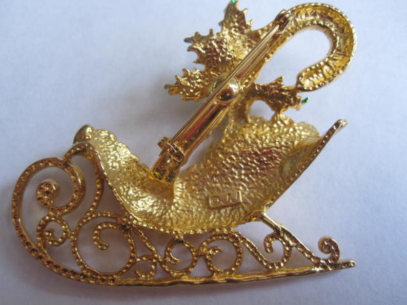 Large JJ Christmas Fancy Sleigh Brooch with Candy Cane Holly Crystal Rhinestones Gold Tone Signed Pin