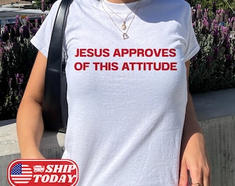 Camiseta infantil "Jesus aprova essa atitude", camiseta cristã engraçada estilo anos 2000, camiseta sarcástica com humor religioso, roupa fofa para igreja, camiseta ideal para presentear na Páscoa.