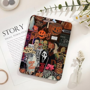 May include: A rectangular tablet case featuring a collage of horror movie characters and Halloween imagery, including pumpkins, ghosts, and iconic masks. The design incorporates text such as Halloween, Happy Halloween, and What is your favourite scary movie.