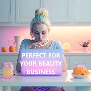 May include: A woman with blonde hair in a bun sits at a table with a laptop. The laptop screen displays the text "PERFECT FOR YOUR BEAUTY BUSINESS".