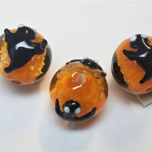 Glow in the dark Ghost lampwork beads 2pc