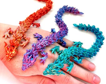 Dragón articulado impreso en 3D: juguete sensorial brillante e inquieto