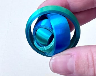 Esfera giratoria antiestrés impresa en 3D: juguete sensorial brillante que brilla en la oscuridad y alivia el estrés (3,8 cm)