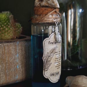 Featherfall Potion – Handmade Blue Glass Bottle, Fantasy Elixir for RPG & Wizard Décor