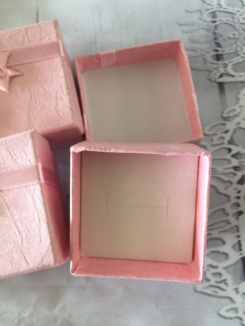 Small pink gift boxes