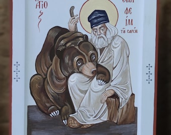 Hand-painted icon of Saint Seraphim of Sarov with a bear, measuring 20x15x2.5 cm