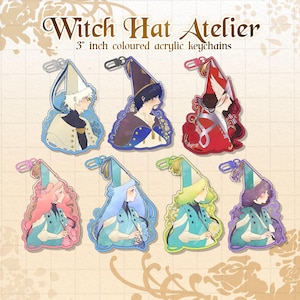 May include: Seven 3-inch acrylic keychains featuring characters from Witch Hat Atelier. Each keychain displays a character in a pointed hat with unique color schemes including blue, purple, red, pink, light blue, yellow, and violet accents.