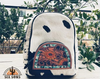 Mochila de cuero para mujer, mochila de cuero hecha a mano, mochila de piel de vaca con pelo, bolso de pañales de cuero hecho a mano, bolso estilo western
