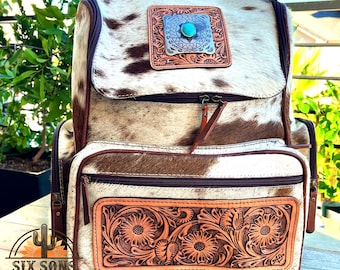Mochila de cuero repujado a mano, bolso para pañales de piel de vaca con pelo, joya turquesa