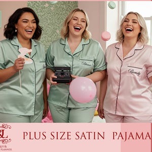 May include: Three women wearing plus size satin pajamas in mint green and pink. The pajamas have black trim and are personalized with names. One woman holds a pink balloon, another a Polaroid camera, and another a paper cutout.