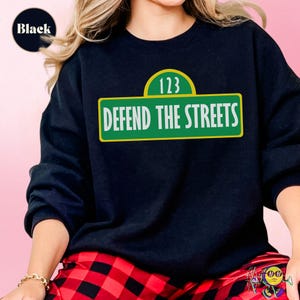 Defend the Streets: Protect PBS and Public Services Shirt for Liberals