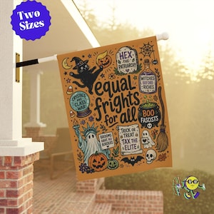 May include: A rectangular orange garden flag featuring black, white, and purple illustrations of a cat, a ghost, a cauldron, and a tombstone. The text reads: equal frights for all, hex the patriarchy, witches before riches, boo fascists, and tax the elite.