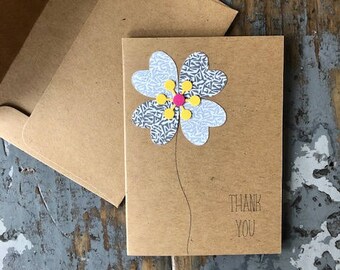 Enveloppe recyclée carte fleur Merci blanc à l’intérieur