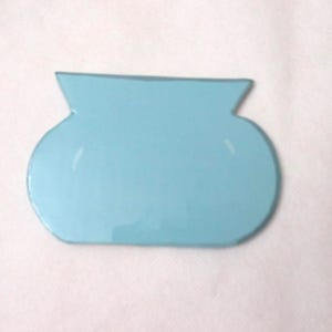 May include: A light blue, vase-shaped object with a rounded base and flared top. The object has a smooth, glossy finish and is set against a white background. The design is simple and modern, with a symmetrical shape.