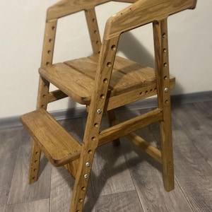 Children&#39;s growing chair, increased size 24 inches. For bars and high tables. Wooden adjustable chair for feeding. Ash kids chair.