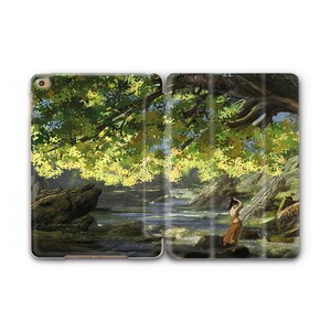 May include: An open tablet case featuring a scenic illustration of a woman standing near a river. The artwork depicts a lush green forest with a flowing river, rocks, and a large tree with yellow leaves. The woman is wearing a long orange dress.