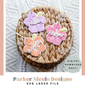 May include: Three laser-cut hibiscus flower tags in pink and orange hues, each with a name in white script. The tags are displayed on a woven basket. The image also includes the text "DIGITAL DOWNLOAD ONLY!"
