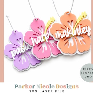 May include: Three hibiscus flower ornaments in purple, pink, and orange, each featuring a white script name overlay. The ornaments hang from white strings. A circular badge in the corner reads DIGITAL DOWNLOAD ONLY! and the text Parker Nicole Designs SVG LASER FILE appears at the bottom.