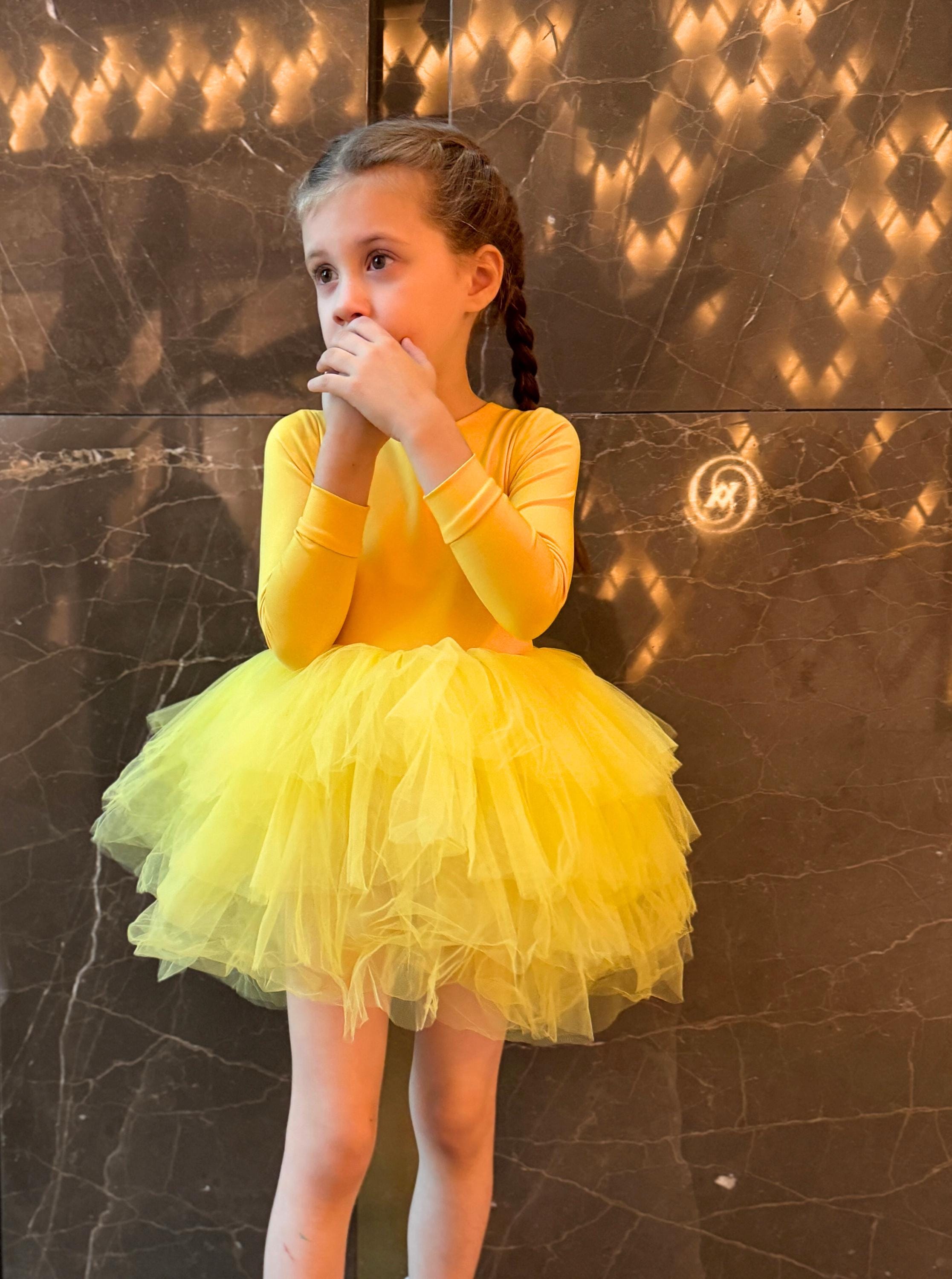a ballet dancer dressed in a golden yellow tutu Yellow Dryad Corps de Ballet Tutu Rental – Tutu Theatre main image 1