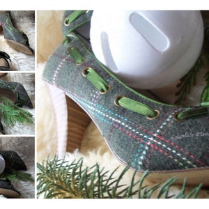 May include: High-heeled shoes with a green and gray plaid pattern, featuring green ribbon laces and a bow. The heels are wooden, and the shoes are decorated with a white ball and evergreen sprigs. The shoes have a peep-toe design.