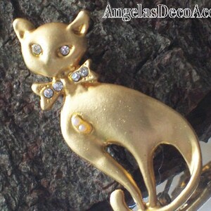 Vintage Cat Pin Pet Whimsy Sleek BroochFigural Mod JewelryVintage FelineCostume JewelryMatte Gold ToneCrystal Like Eyes and Bow Tie Pin image 2