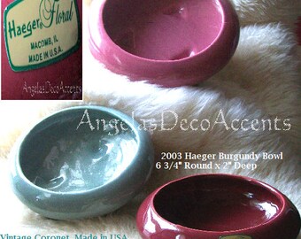 May include: Four ceramic bowls in different colours and sizes. The bowls are made by Haeger and are in vintage condition. The bowls are 6 3/4 inches, 7 inches, and 9 1/2 inches in diameter. The bowls are 2 inches, 2 1/4 inches, and 2 3/4 inches deep.