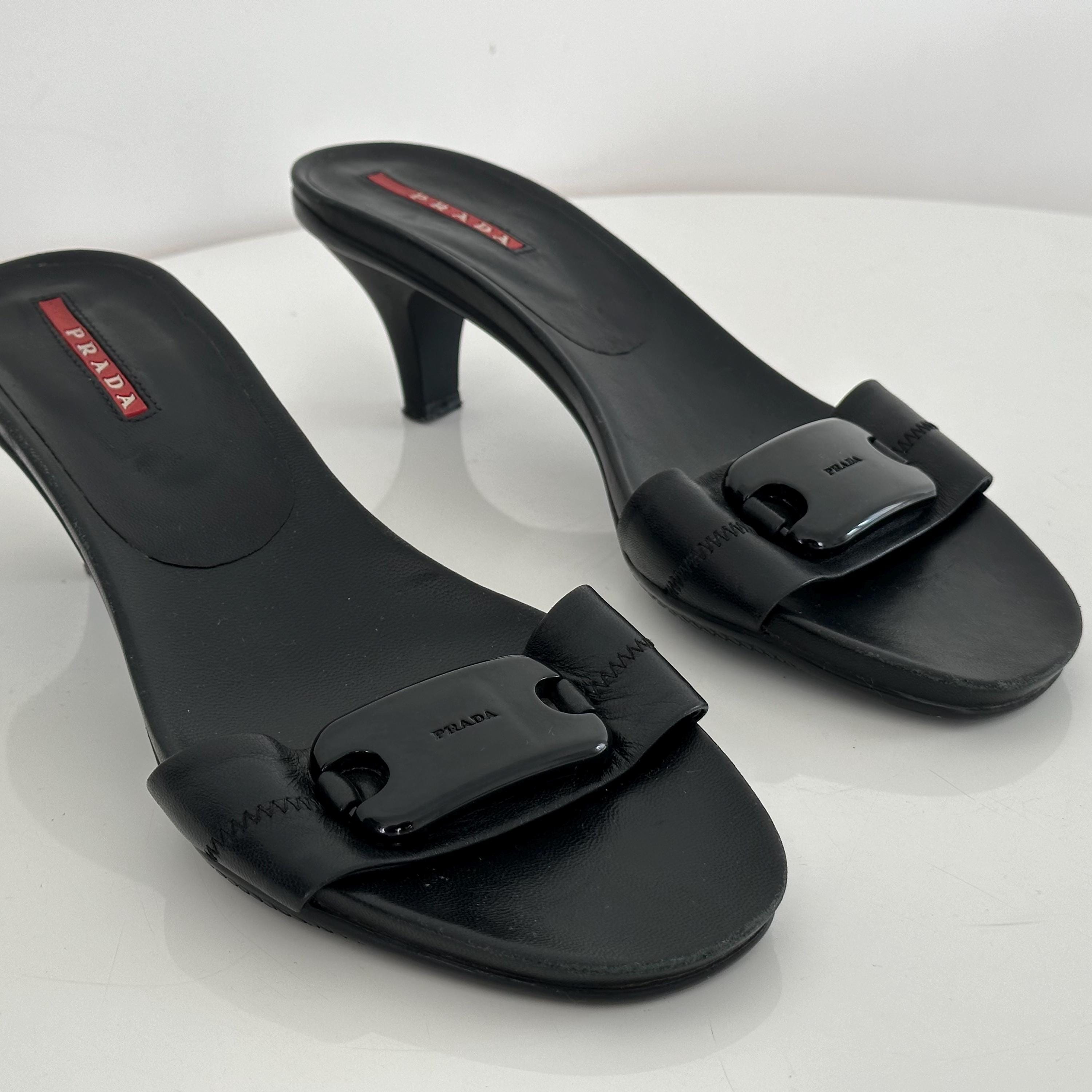 Arcive PRADA leather mules black