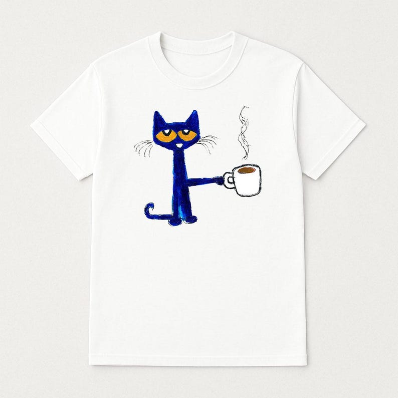 May include: White t-shirt with a blue cat illustration holding a cup of coffee. The cat has orange eyes and a white mustache. The text "Blue's Clues" is not visible in the image.