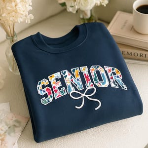 Embroidered Senior Coquette Bow Sweatshirt, Floral Senior Sweater, Custom Grad Year Shirt, Cheerleader Crewneck, Graduation Gift