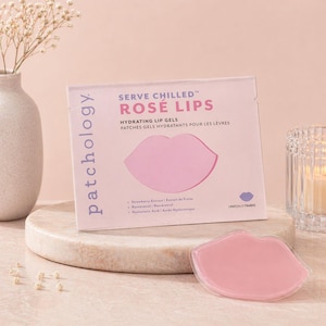 May include: A package of "SERVE CHILLED ROSE LIPS" hydrating lip gels. The package is light pink with a pink lip graphic. A single lip gel is visible in front of the package. The package lists ingredients like strawberry extract and hyaluronic acid.