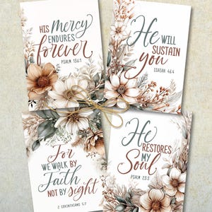 May include: Four rectangular art prints featuring floral illustrations in shades of brown, cream, and sage green. Each print displays religious text: His mercy endures forever, He will sustain you, For we walk by faith not by sight, and He restores my soul.
