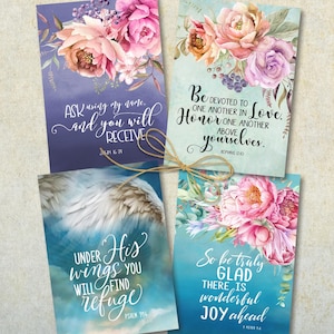 Pode incluir: Quatro impressões de arte floral amarradas com barbante. Cada impressão apresenta flores em aquarela e citações inspiradoras. A paleta de cores inclui tons de rosa, roxo e azul. As impressões são da ArtCult, uma loja Etsy de arte digital.