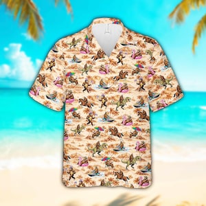 Lustiges Bigfoot Sasquatch Hawaiihemd für Männer Frauen, Sasquatch Reit T-Rex Vaterländisches Hemd mit Knöpfen, Sasquatch Flamingo Float Aloha Hemd