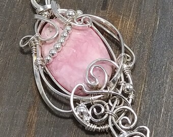 Rhodochrosite and Sterling Silver Small Pendant, oval bead, wirewrapped