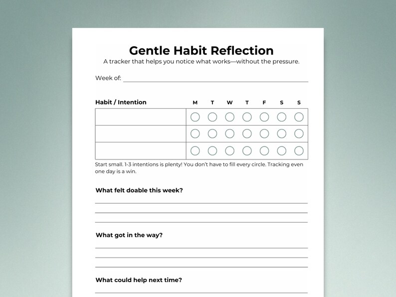 Close-up of the 'Gentle Habit Reflection' printable worksheet. Features a table for tracking three habits or intentions with a 7-day circular tracker (M-S). Includes a supportive note encouraging small starts. Below are three reflection prompts: 'What felt doable this week?', 'What got in the way?', and 'What could help next time?'. Minimalist design with black text on a clean white layout and a soft sage green background.