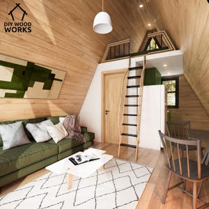 May include: A small, wooden cabin interior with a green sofa, a white coffee table, and a ladder leading to a loft bed. The cabin has a wood-paneled ceiling and a large window.
