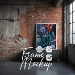 May include: A framed abstract art print with a white border, featuring a surrealist design in shades of green, blue, red, and white. The artwork is displayed on a black cabinet against a brick wall. The words "Frame Mockup" are written in cursive.